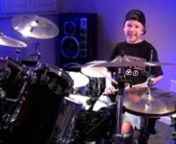 Avery Molek (8 year old drummer) drumming to