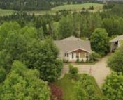 82 acres with a beautiful 3 bedroom rancher, in-law suite in walkout basement, with over 4000 sq. Ft of living space.2.5 bath plus 5 piece ensuite, large open kitchen with an island, Jenn-air gas range, double oven and huge panty.In-floor heating up and down, with N/G hot water heat with air exchanger, also heats over-sized double garage and attached greenhouse.Lots of room to relax and enjoy the view, riding/walking trails throughout.The shop is 30 x 48 heated and insulated, 2 leans on
