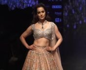 Kangana Ranaut looks like a dream QUEEN walking the ramp for Lakme Fashion Week 2019. Kangana Ranaut turned muse as she walked the ramp for designer Anushree Reddy. The Manikarnika actress looked ravishing in an embellished lehenga. She donned a heavily intricate designed peach coloured lehenga. The modern bridal lehenga accentuated her sleek and toned mid-riff, also highlighting her neckline. The empty neck was decorated with a stunning emerald and diamond neckpiece, extending the royalty of th