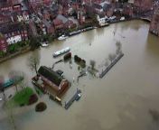 Shocking aerial images show how residential areas in a town have been turned effectively into islands as a result of flooding after heavy downpours battering Britain.&#60;br/&#62;Parts of Tewkesbury, Glos., have been almost completely cut off by flood water after the River Severn burst its banks following days of torrential rain.&#60;br/&#62;Dramatic photographs show King Johns Court housing estate in the town marooned by water as well as the local pub The Boat House.