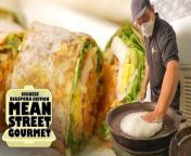 How do you make the world’s thinnest pancake (just 1mm thick!) and stuff it with vegetables, seafood, fritters, nuts, and sauces, and then make sure it doesn’t break? This 84-year-old popiah shop in Singapore shows us exactly how. &#60;br/&#62;&#60;br/&#62;Shop address: Kway Guan Huat Joochiat Popiah, 95 Joo Chiat Road, Singapore 427389&#60;br/&#62;&#60;br/&#62;This is the first episode of our latest “Mean Street Gourmet” series about mom-and-pop stores across the Chinese diaspora. In the next episode, we visit a restaurant in Houston that makes wonton noodles inspired by other Asian cuisines.&#60;br/&#62;&#60;br/&#62;0:00 From Fujian to Singapore &#60;br/&#62;01:37 Making the world’s thinnest pancakes&#60;br/&#62;03:45 Spicy, crunchy, umami fillings&#60;br/&#62;05:32 From pharmacist to popiah maker &#60;br/&#62;&#60;br/&#62;Don’t miss our stories, what’s buzzing around the web, and bonus material. Sign up for the GT NEWSLETTER: http://gt4.life/YTnewsletter&#60;br/&#62; &#60;br/&#62;If you liked this video, we have more stories featuring mom-and-pop shops in China:&#60;br/&#62;&#60;br/&#62;Golden, Crispy “Sugar Melons” Only Made in Winter&#60;br/&#62;https://dai.ly/x87asn1 &#60;br/&#62;&#60;br/&#62;‘We Sweat Buckets’: Making Sugared Scallion Candy&#60;br/&#62;https://dai.ly/x8a5cfi &#60;br/&#62;&#60;br/&#62;Follow us on Instagram for behind-the-scenes moments: http://instagram.com/goldthread2 &#60;br/&#62;Stay updated on Twitter: http://twitter.com/goldthread2 &#60;br/&#62;Join the conversation on Facebook: http://facebook.com/goldthread2 &#60;br/&#62;Have story ideas? Send them to us at hello@goldthread2.com&#60;br/&#62;&#60;br/&#62;&#60;br/&#62;Producer: Rachel Phua&#60;br/&#62;Videographer: Lau Hon Meng &#60;br/&#62;Editor: Cliff Man&#60;br/&#62;Animation: Stella Yoo&#60;br/&#62;Mastering: Victor Peña&#60;br/&#62;&#60;br/&#62;#singapore #popiah #springroll&#60;br/&#62;