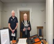 The RNLI team in Farnham, Haslemere &amp; Godalming celebrated the 200 year anniversary of the organisation with a scroll signing ceremony.&#60;br/&#62;&#60;br/&#62;Sealed inside a custom orange buoyant briefcase encapsulated the scroll that will be sent to over 250 branches of the RNLI.&#60;br/&#62;&#60;br/&#62;Inside the briefcase is a scroll made from bamboo paper and the spindle ends are from a 19th century flag pole from the Isle of Man.&#60;br/&#62;&#60;br/&#62;The scroll will have it’s permanent home in the RNLI college in Poole.&#60;br/&#62;&#60;br/&#62;The RNLI Scroll began its journey on Monday 4 March 2024 at Westminster Abbey to mark the charity’s official 200th anniversary. It was signed by the RNLI President, HRH Duke of Kent, the Archbishop of Canterbury, the Dean of Westminster and leading RNLI representatives.&#60;br/&#62;On this scroll is the RNLI’s One Crew pledge, in which the RNLI’s promise the commitment to saving every one we can, without judgment – staying true to Sir William Hillary’s vision when he founded the charity in 1824.&#60;br/&#62;&#60;br/&#62;The Farnham, Haslemere &amp; Godalming branches of the RNLI are all continuing to raise money for the organisation through various means such as abseiling Guildford cathedral.&#60;br/&#62;The Chairman of the Farnham &amp; District Branch is Nigel Cuthbert who will be invited to sign the Pledge. As part of the 200 year celebrations the Branch is organising a quiz&#60;br/&#62;night on the 20th April and an afternoon Bridge session in August.&#60;br/&#62;Local branches are holding events during the year to celebrate the anniversary with Godalming holding a sponsored abseil down Guildford Cathedral on June 15th, Haslemere holding an open garden on the 9th June. The local branches at Alton and Petersfield are also having celebratory events.