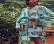 Prompt Midjourney : female danish swedish model wearing 90s classic americana pastel sky blue 100% momme silk with polyester batwing style fringe, silk blazer hybrid robe with oversized elongated sleeve cuff and hem detail sleepwearmonochromatic tonal baby elephants playing football elephant in the raj surrealist floral tropical birds toile de jouy spartial print pattern vogue quality fashion --v 6.0 --ar 1:2