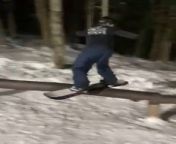 This guy told his fellows he was attempting a cool snowboarding trick. Unfortunately, he jumped off a snow ramp and landed on the railing, but while sliding on it, he lost his balance and crashed on his back.
