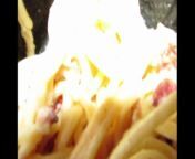 Flashes of spaghetti noodles and segments of a to-go box fill the screen and create an impressionistic vision of leftove &#124; dG1fYTZ4VllxcUZPajA