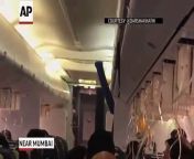 A Jet Airways flight returned to Mumbai Thursday after dozens of passengers complained of ear pain and nose bleeds due to a loss of cabin pressure. Oxygen masks were deployed and one passenger filmed the frightening experience.