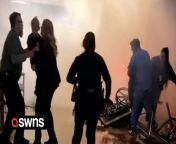Dramatic footage shows the immediate aftermath after a car crashed into an emergency room.&#60;br/&#62;&#60;br/&#62;The car burst through the ER lobby at St. David’s North Austin Medical Center in Austin, Texas, killing one and injuring five.&#60;br/&#62;&#60;br/&#62;The video shows the car in the ER&#39;s lobby, tyres still skidding on the floor causing smoke to billow into the room. &#60;br/&#62;&#60;br/&#62;People can be seen getting treatment from doctors and nurses present and appearing to call for help&#60;br/&#62;&#60;br/&#62;The crash, which took place around 5:38 pm on Tuesday, underwent preliminary inspection and was deemed unintentional by Austin Police.&#60;br/&#62;&#60;br/&#62;The driver was extricated from the car by the fire department and given CPR but was pronounced dead at the scene.