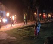 This is a fire torch parade performance celebrating the Eid al-Fitr holiday in villages in Indonesia