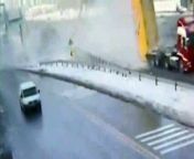 A truck travelling with its dumper raised has hit a pedestrian footbridge in Istanbul, injuring one person crossing. No one was killed. &#60;br/&#62;. . Follow us on twitter at http://twitter.com/itn_news.