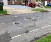 St Leonard&#39;s Road near its junction with Comptons Lane is littered with craters like the surface of the moon.