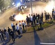 CCTV video shows the shocking moment a driver does doughnuts at an illegal car meet.