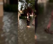 Video showing people wading through water as Dubai is hit by heavy flooding