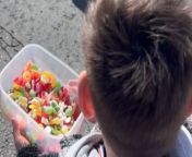 At the Brighton marathon, this young autistic boy stood by the sidelines with a bowl filled with sweets.&#60;br/&#62;&#60;br/&#62;His face was beaming with joy.&#60;br/&#62;&#60;br/&#62;He eagerly offered the candies to passing runners.&#60;br/&#62;&#60;br/&#62;He felt a rush of excitement each time they gratefully accepted his sweets.&#60;br/&#62;&#60;br/&#62;The boy was amazed by how cheerful and courteous the runners were, thanking him with big smiles as they continued on their race.&#60;br/&#62;&#60;br/&#62;His heart swelled with happiness, knowing he was part of making their marathon journey a little sweeter. &#60;br/&#62;Location: Crowborough, United Kingdom &#60;br/&#62;WooGlobe Ref : WGA217634&#60;br/&#62;For licensing and to use this video, please email licensing@wooglobe.com