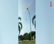 Two military helicopters collided in mid-air before crashing and killing at least 10 people in Malaysia this morning.&#60;br/&#62;&#60;br/&#62;The choppers were among seven that had taken off simultaneously from the the Royal Malaysian Navy (TLDM) Base in Lumut, Perak, Tuesday, April 23, shortly after 9 am local time.&#60;br/&#62;&#60;br/&#62;But the footage shows how two of the touched rotors at a height of around 200ft - sending both aircraft hurtling to the ground in deadly tailspins.&#60;br/&#62;&#60;br/&#62;One helicopter crashed onto a running track and burst into flames. The other is understood to have come down on the edge of the stadium.&#60;br/&#62;&#60;br/&#62;Local media reported that as many as 10 people died, consisting of seven crew members and three passengers.&#60;br/&#62;&#60;br/&#62;The accident occurred during training ahead of the TLDM&#39;s 90th anniversary celebrations.&#60;br/&#62;&#60;br/&#62;The two helicopters involved in the collision were HOM and Fennec models. The HOM helicopter was carrying four crew and three passengers, while the Fennec was carrying three crew.