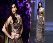 Karishma Tanna turns a showstopper at the Bombay Times Fashion Week day 4. The wears a brown lehenga designed in a modern-vintage way.